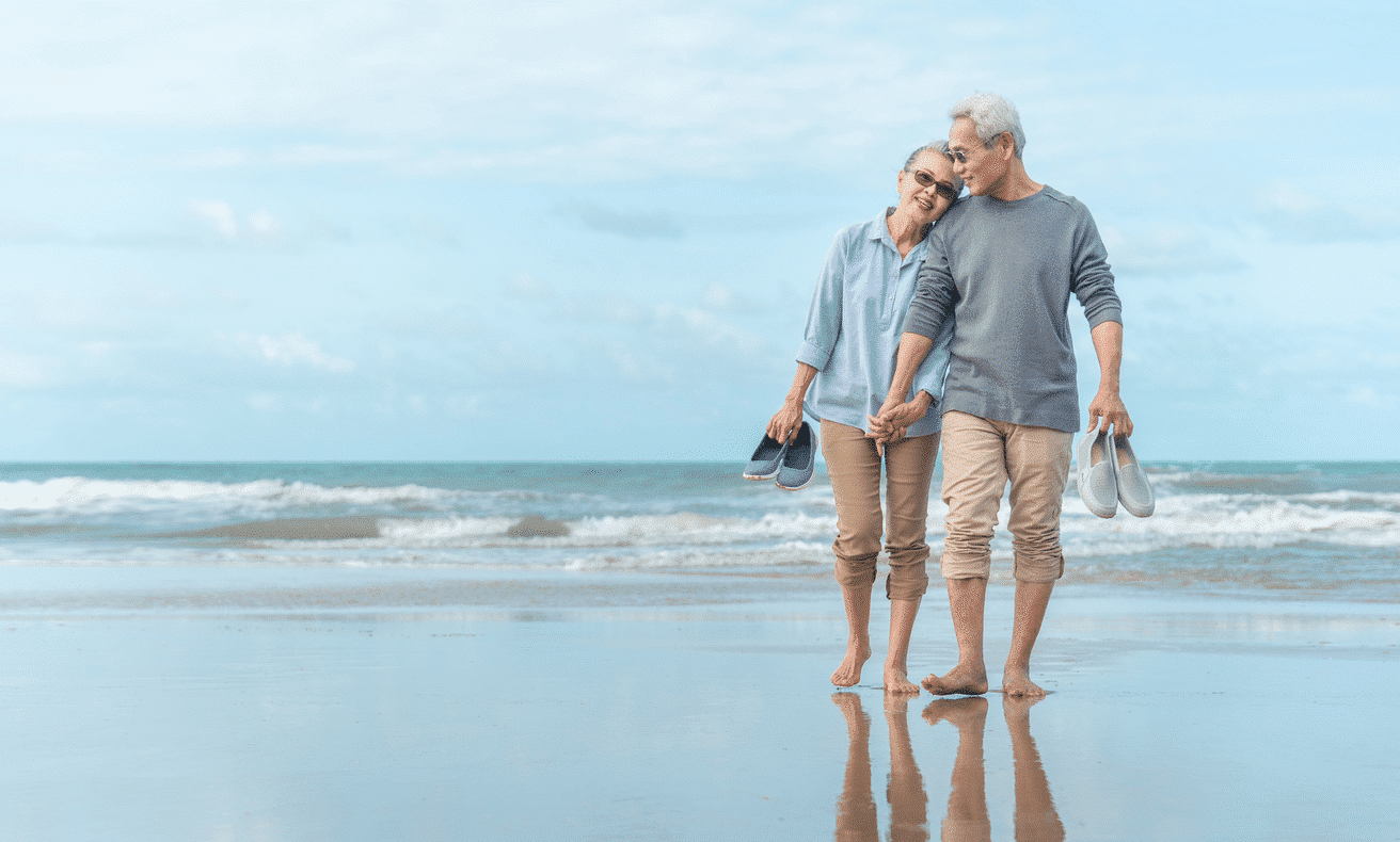 Couple walking on beach