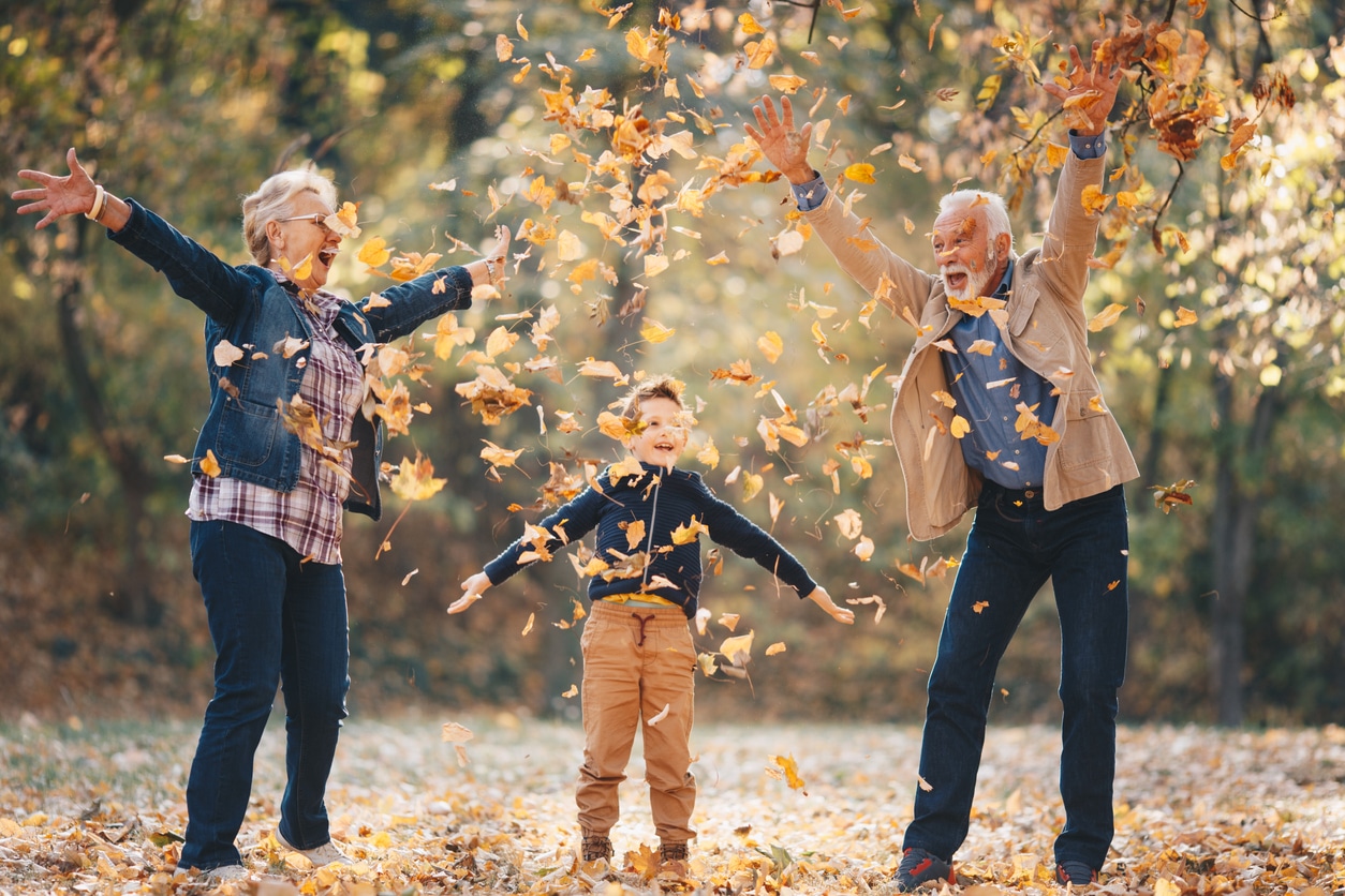 Seniors in the autumn leaves